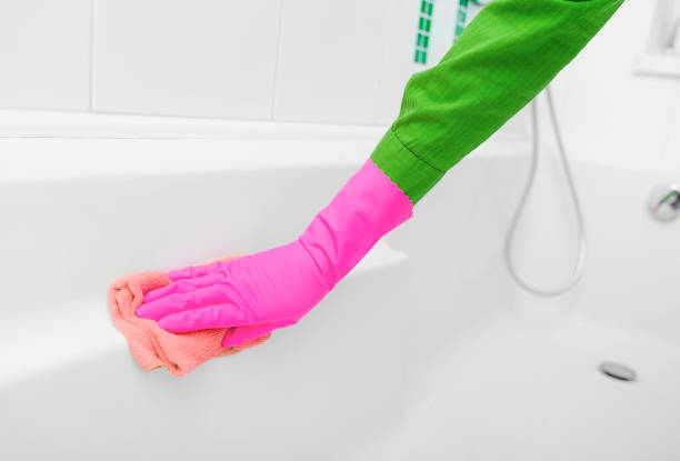 istock Hands in rubber gloves wash the shower. 965541040