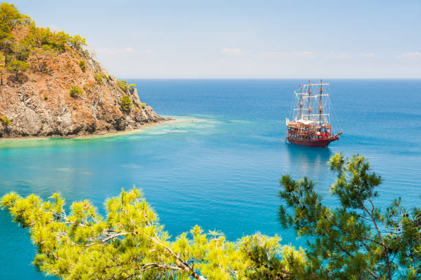 istock Sea coast with pines near Kemer, Turkey 965546178