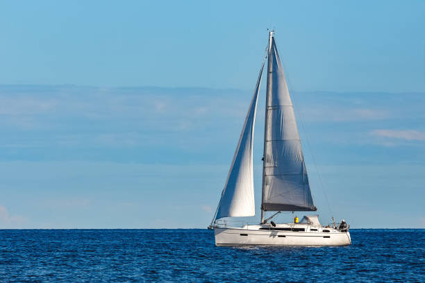 istock White sailboat traveling at Riga 965551006