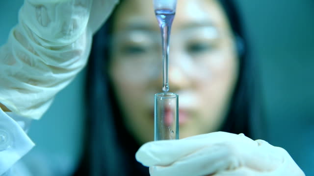 Chemist working in laboratory