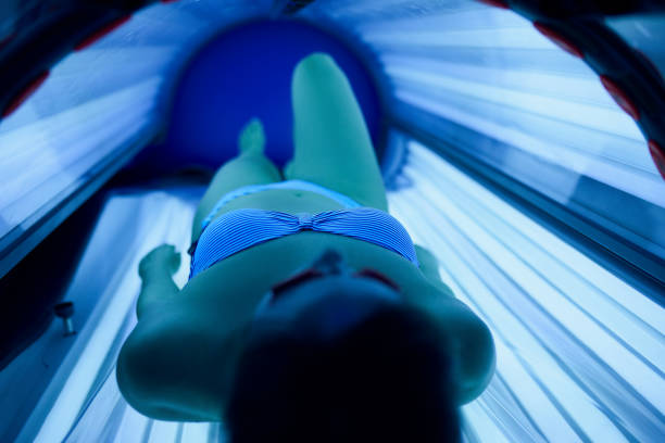 istock Young Women In The Solarium 965557258