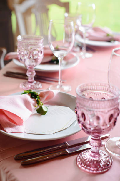 istock Wedding tables set for banquet or wedding event catering. Party celebration wedding concept. Flowers wedding decoration of tables for guests of bride and groom. Table appointment event 965560274