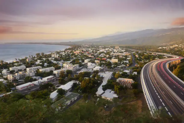 Photo of Light trails of cars on the tamarin road in Saint Paul, Reunion Island