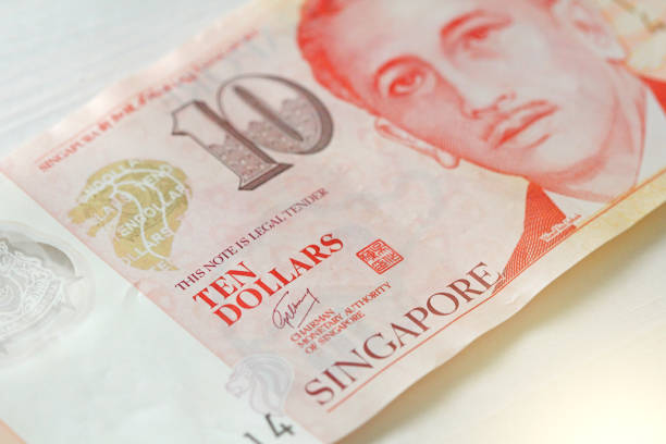 istock Ten Singapore Dollars With One Note. 10 Dollars 965562132