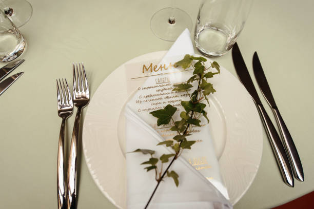 istock Wedding tables set for banquet or wedding event catering. Party celebration wedding concept. Flowers wedding decoration of tables for guests of bride and groom. Table appointment event 965565724