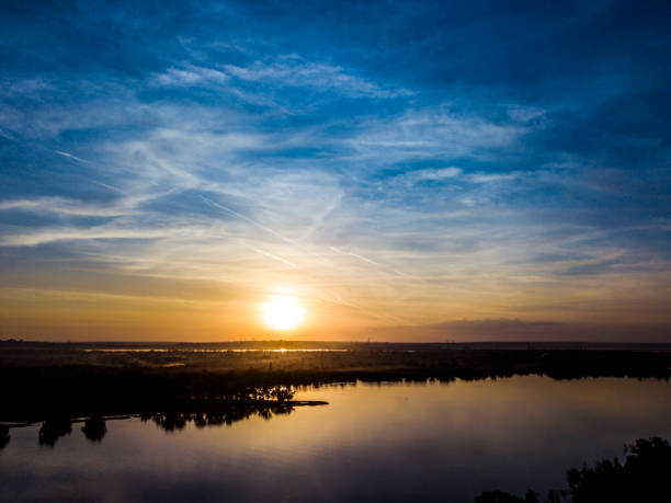 istock fantastic evening on the river during dusk with clear amazing sky 965566240