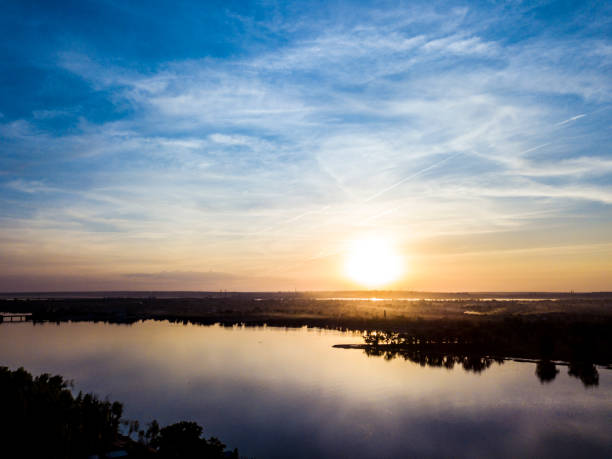 istock fantastic evening on the river during dusk with clear amazing sky 965566268