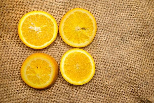 istock Juicy orange cut in half to make orange juice for Breakfast. 965566430