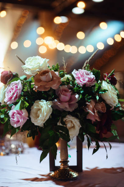 istock Wedding tables set for banquet or wedding event catering. Party celebration wedding concept. Flowers wedding decoration of tables for guests of bride and groom. Table appointment event 965572374