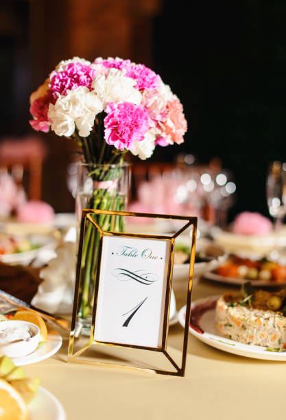 istock Wedding tables set for banquet or wedding event catering. Party celebration wedding concept. Flowers wedding decoration of tables for guests of bride and groom. Table appointment event 965573634