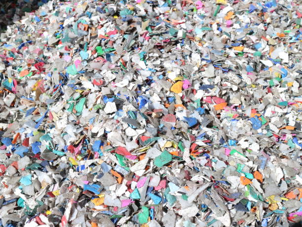 istock Shredded pieces of plastic in different colors 965577084