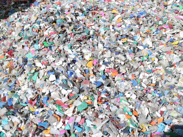 istock Shredded pieces of plastic in different colors 965577122