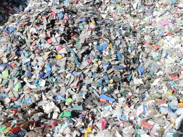 istock Shredded pieces of plastic in different colors 965577236