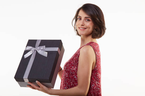 istock cute and beauty young woman with gift boxes 965581912