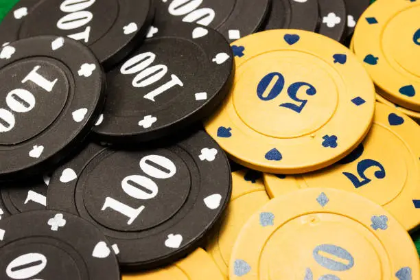 Photo of poker chips closeup of bright and colorful