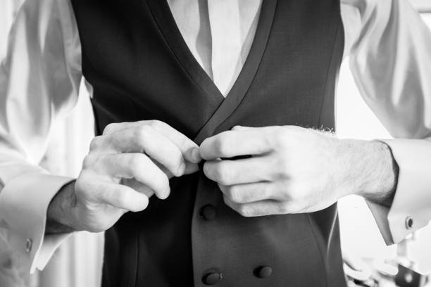 istock Groom in elegant black suit 965593588