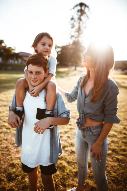 istock happy family have fun in the park 965601290