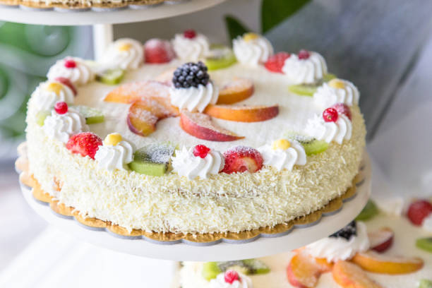 istock wedding cake outdoor with fruits 965601680