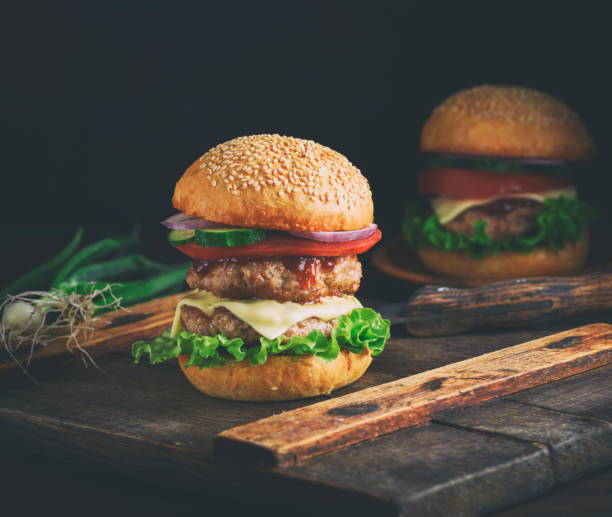 istock double cheeseburger in a bun with sesame seeds 965601902
