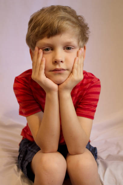 istock Sad boy. Melancholy, sadness and loneliness. 965621380