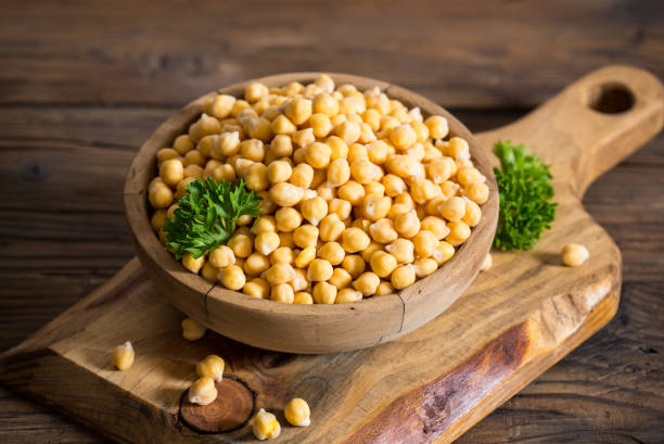 istock Fresh chickpeas in wooden bowl 965644846