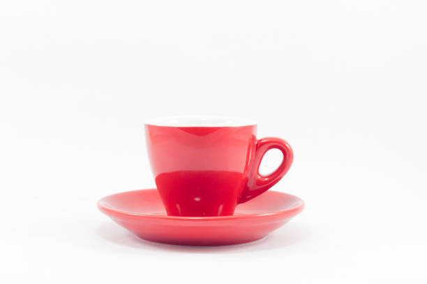 istock Close-Up Of Red Cup And Saucer Against White Background 965645152