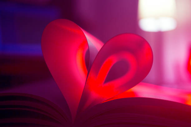 istock Romantic love heart shape made from pages of book. 965658696