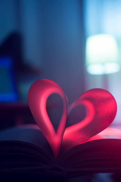 istock Romantic love heart shape made from pages of book. 965658726