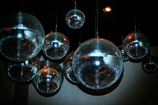 Disco balls in a dark nightclub room