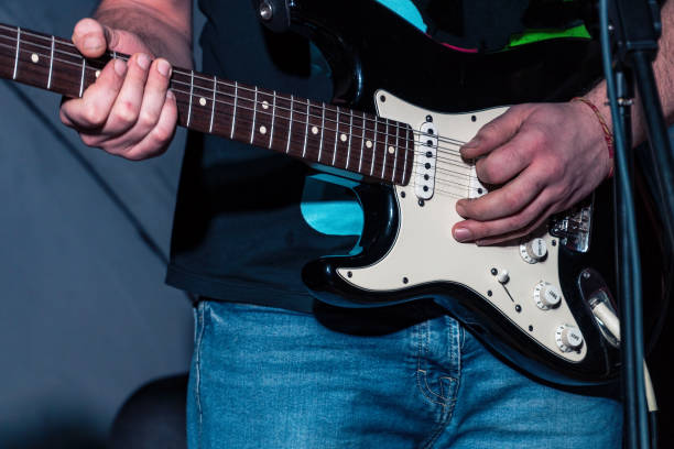 istock Guitarist left-handed plays electric guitar 965661404
