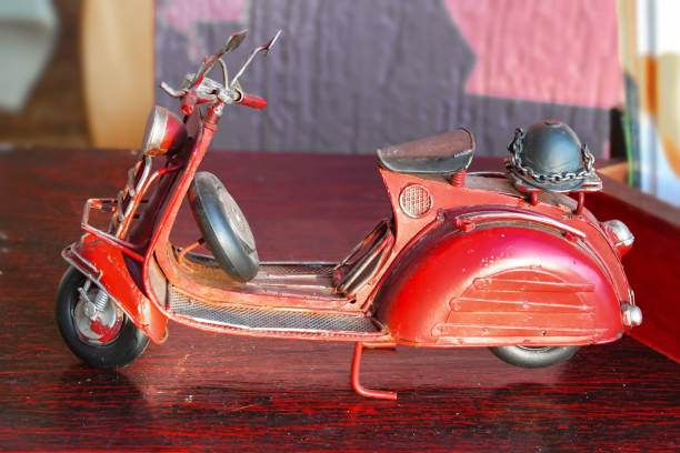 Antique Miniature Red Toy Diecast Tricycle Scooter With German Helmet On  Back Stock Photo - Download Image Now - iStock