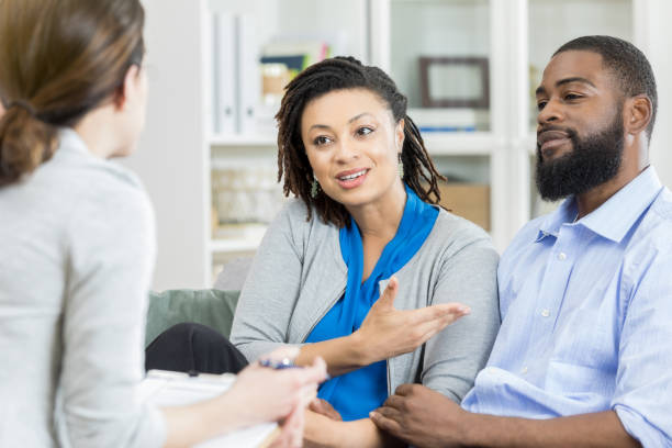 istock Woman blames husband during counseling session 965665494