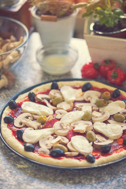 Preparing fresh homemade pizza