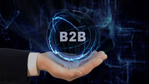 istock Painted hand shows concept hologram B2B on his hand 965674866