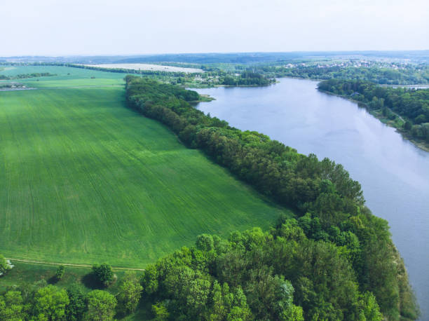 istock aerial view of river. small town on background 965682826