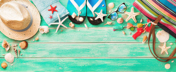 istock Beach Accessories With Seashells On Wooden Board 965687872