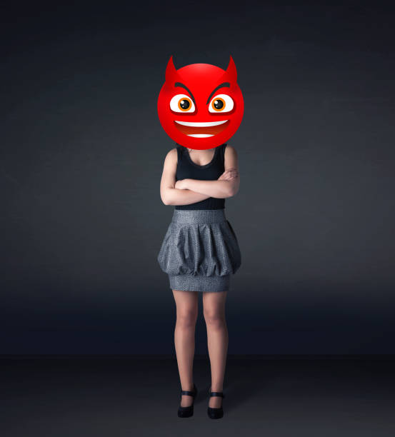 istock businesswoman wears devil smiley face 965691126