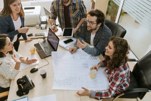 istock Start Up Team Of Freelancers In The Office 965692248