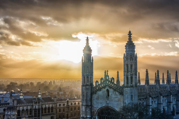 View of King's College, Cambridge University, Cambridge University in the United Kingdom; mystical sky. cambridge england photos stock pictures, royalty-free photos & images