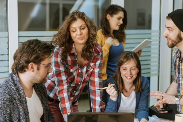 istock Start Up Team Of Freelancers In The Office 965696048