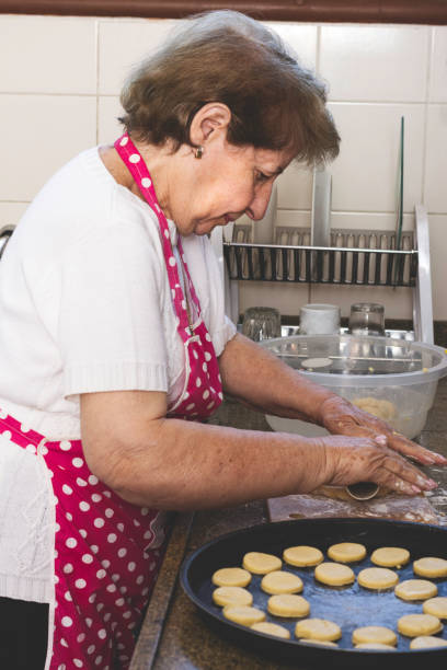 istock Woman preparing alfajores in the kitchen. 965696552