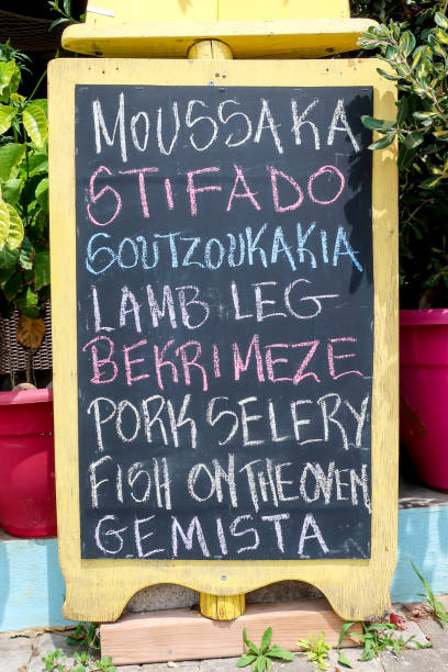 istock Chalkboard menu sign with tradiotional Greek dishes 965701936