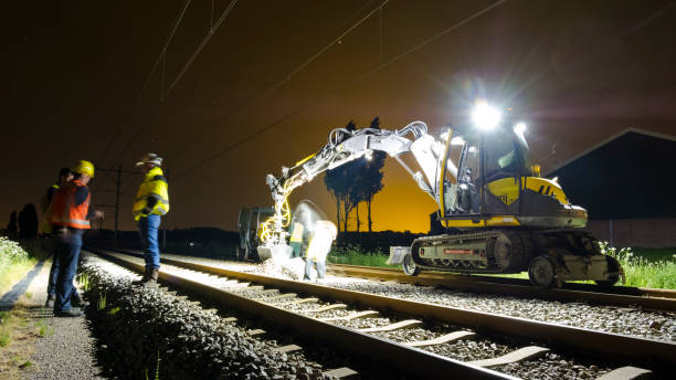 Night shift on a railway track stock photo