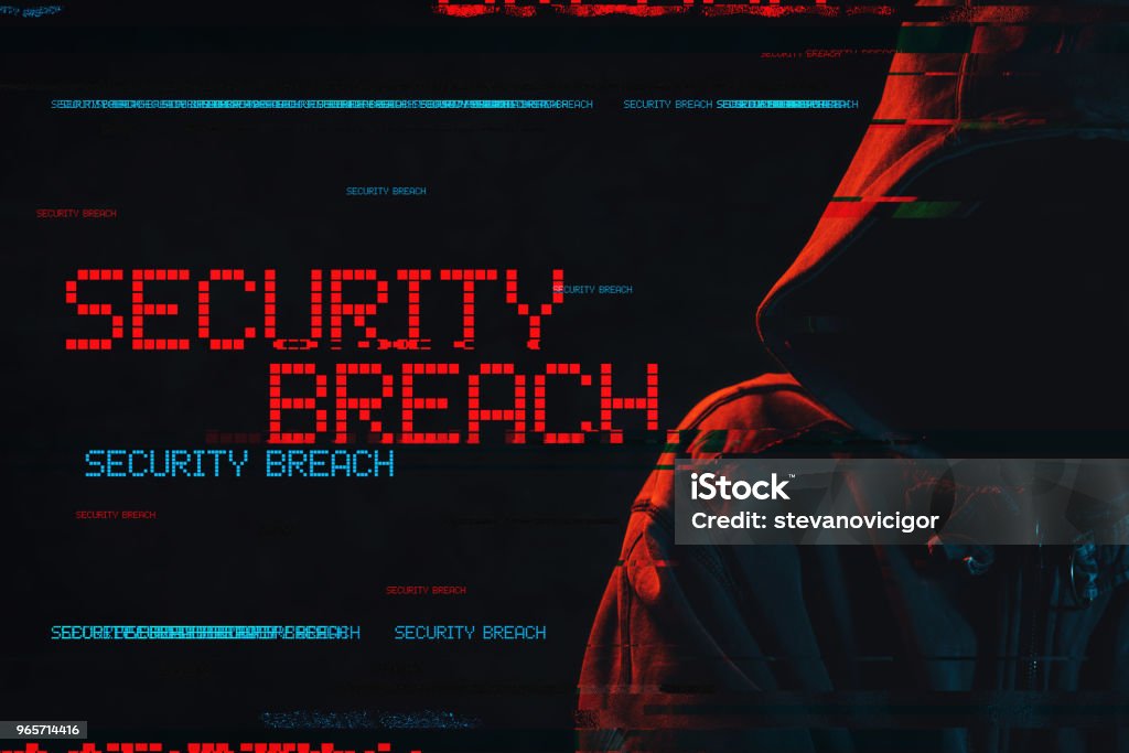 Security breach concept with faceless hooded male person Security breach concept with faceless hooded male person, low key red and blue lit image and digital glitch effect Computer Crime Stock Photo