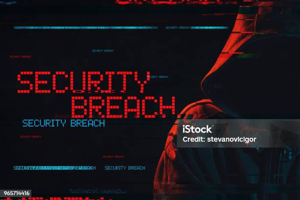 Security Breach Concept With Faceless Hooded Male Person Stock Photo - Download Image Now