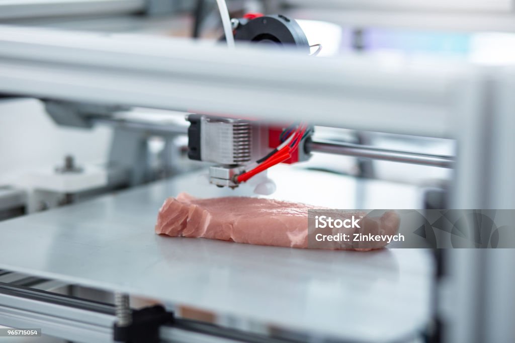 Close up of 3D printer making piece of meat Perfect imitation. The close up of a modern 3D printer making a piece of meat and imitating all the details exactly Three Dimensional Stock Photo