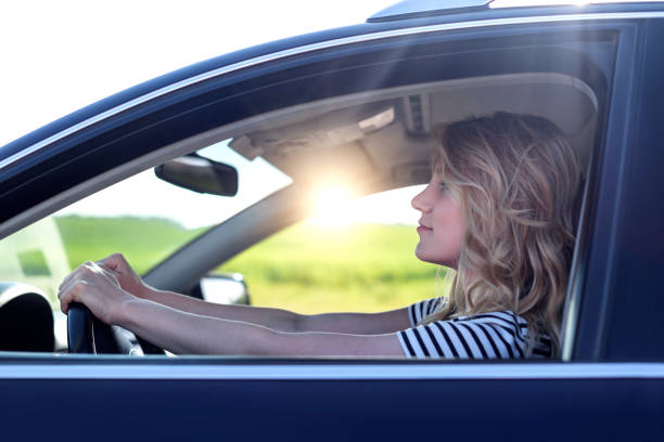 istock Attractive blonde in the car 965718800