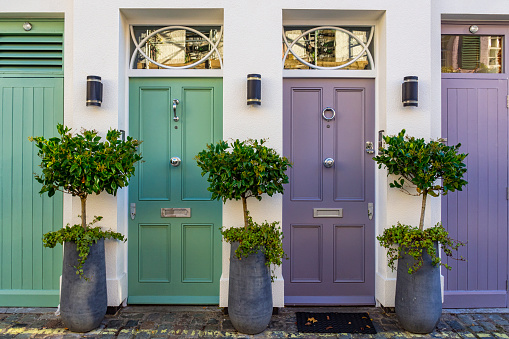 Colored doors in an alley of London