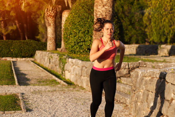 istock Fit Woman Doing Cardio Exercises In The Park 965724398