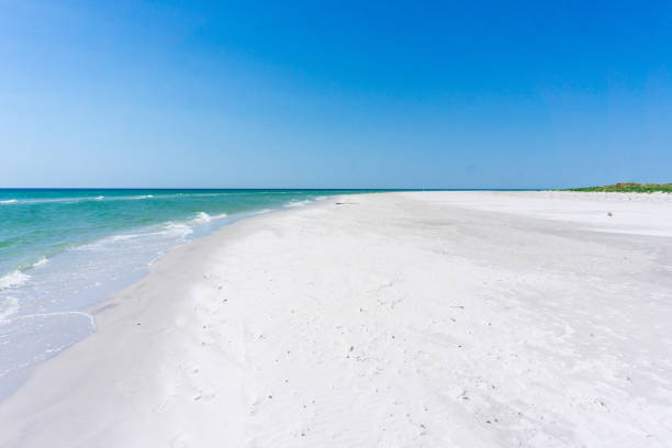 istock Idyllic beach with clear water and waves in Bornholm, Denmark on a day in summer 965749736